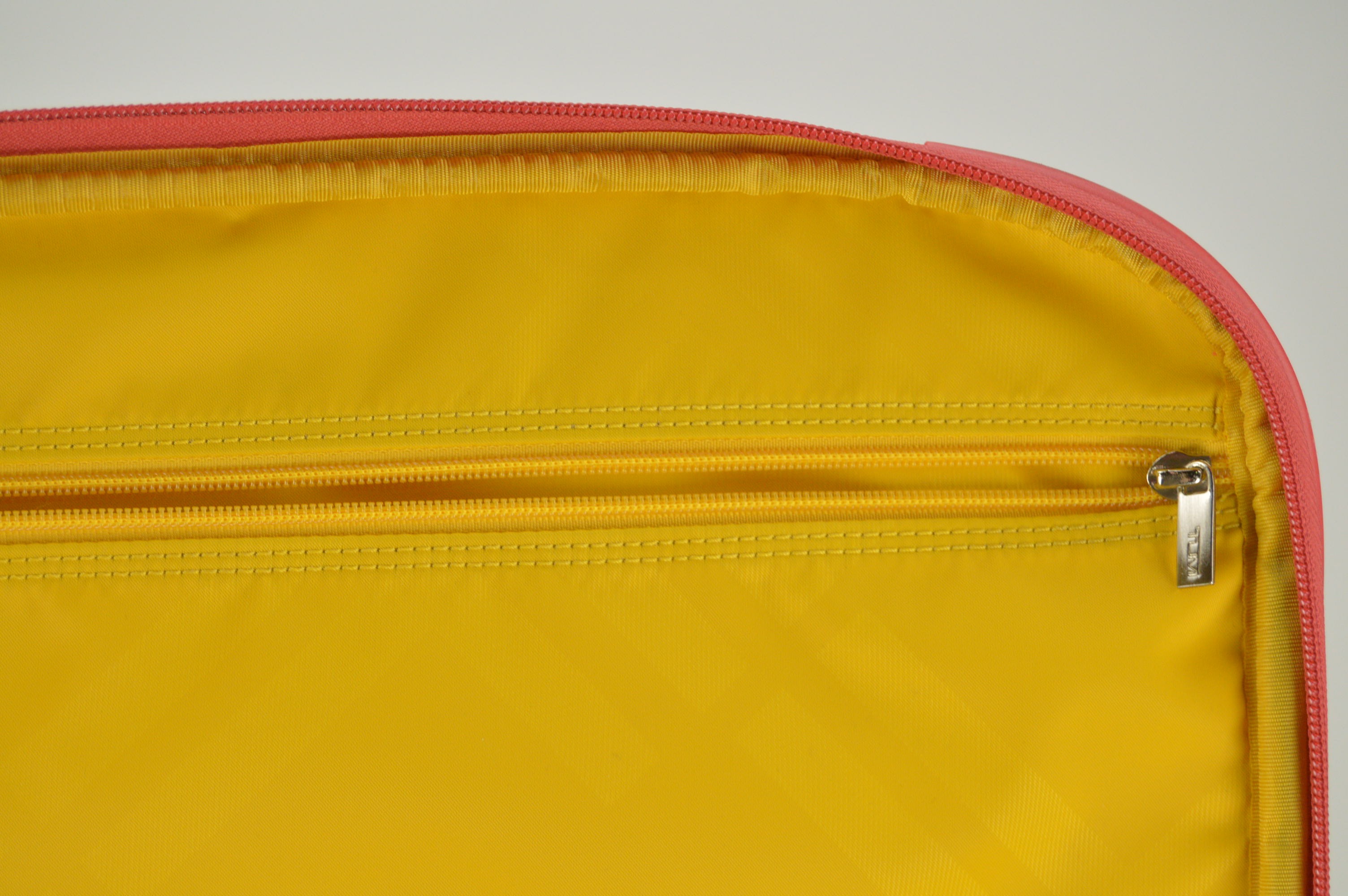 Tumi Small Red Rolling Suitcase