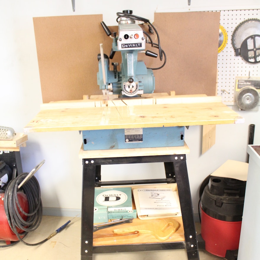 DeWalt Power Shop Radial Arm Saw on Stand and Wall of Blades