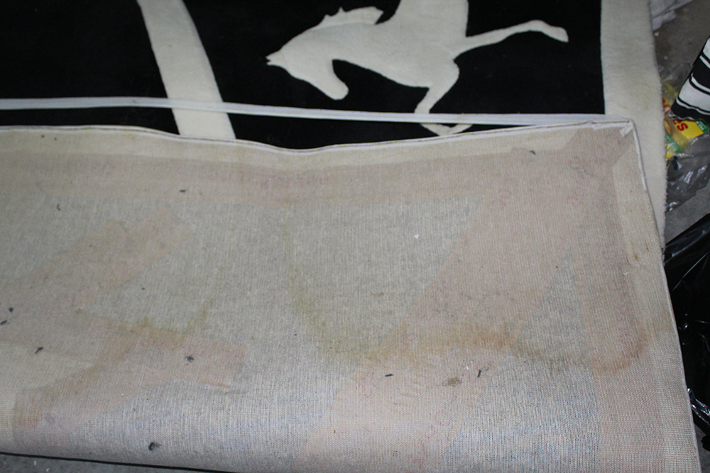 Area Rug with Black and White Horse Motif