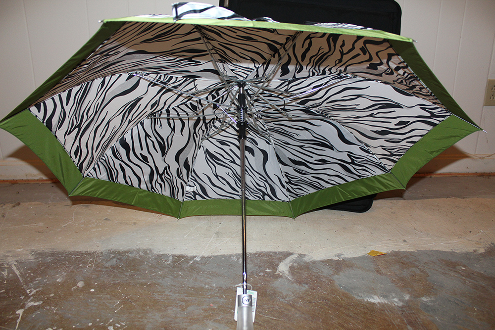 Platinum Hard-Shell Suitcase and Animal Print Jones New York Umbrella