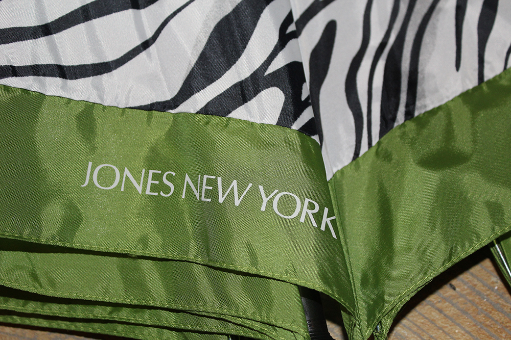 Platinum Hard-Shell Suitcase and Animal Print Jones New York Umbrella