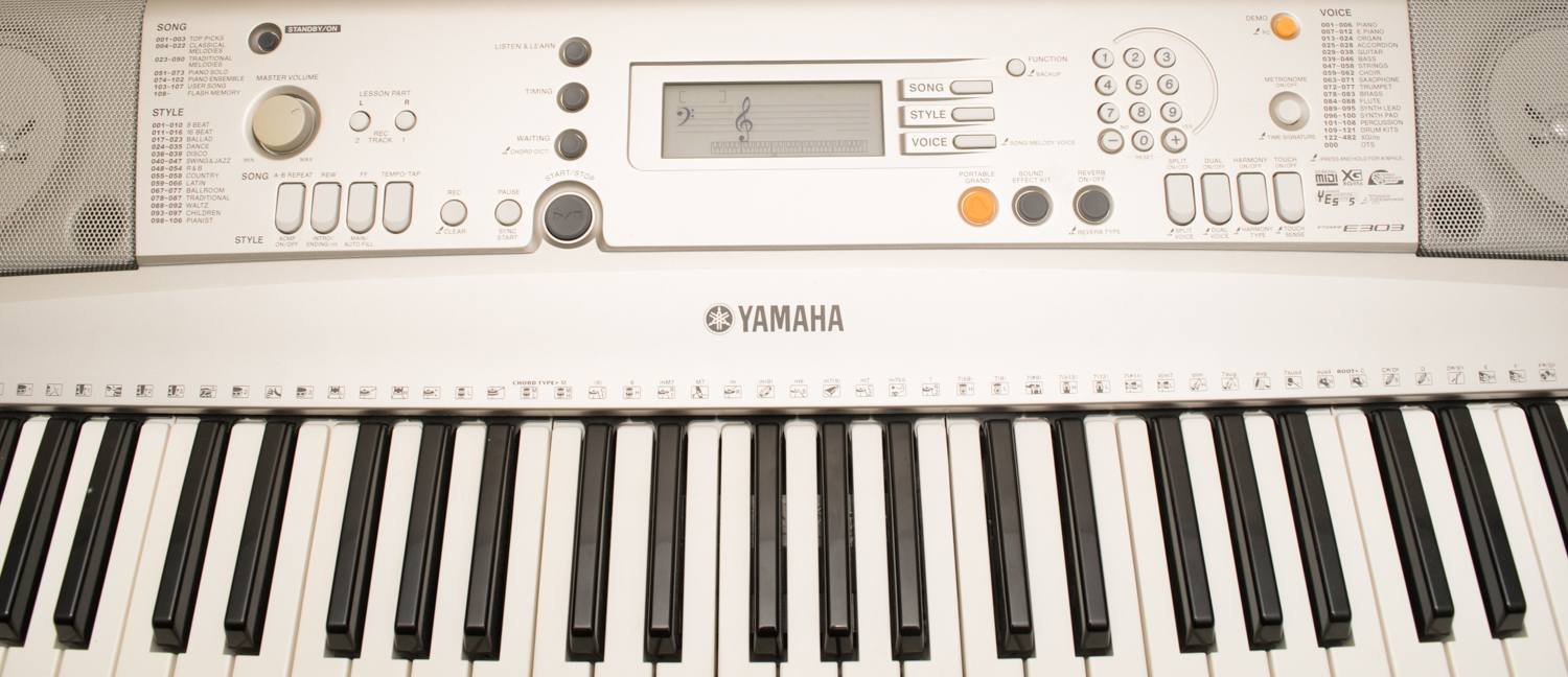 Yamaha PSR E303 Digital Piano and Stand