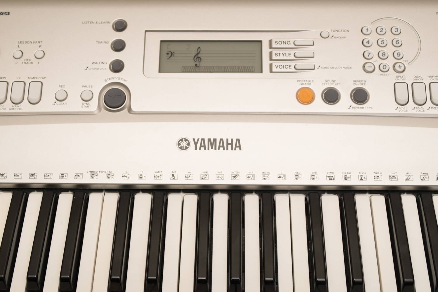 Yamaha PSR E303 Digital Piano and Stand