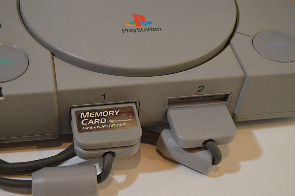 Sony Playstation with Game CD's and CD Storage Box