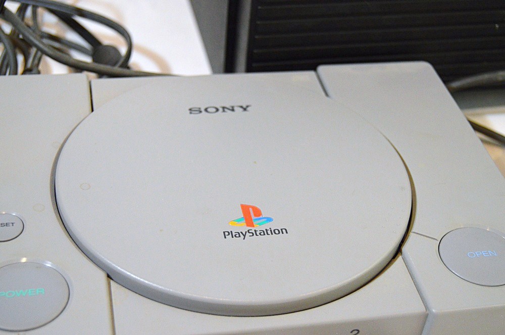 Sony Playstation with Game CD's and CD Storage Box