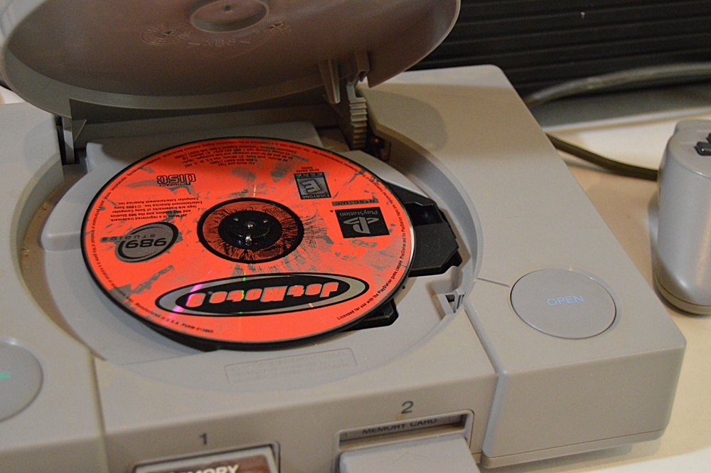 Sony Playstation with Game CD's and CD Storage Box