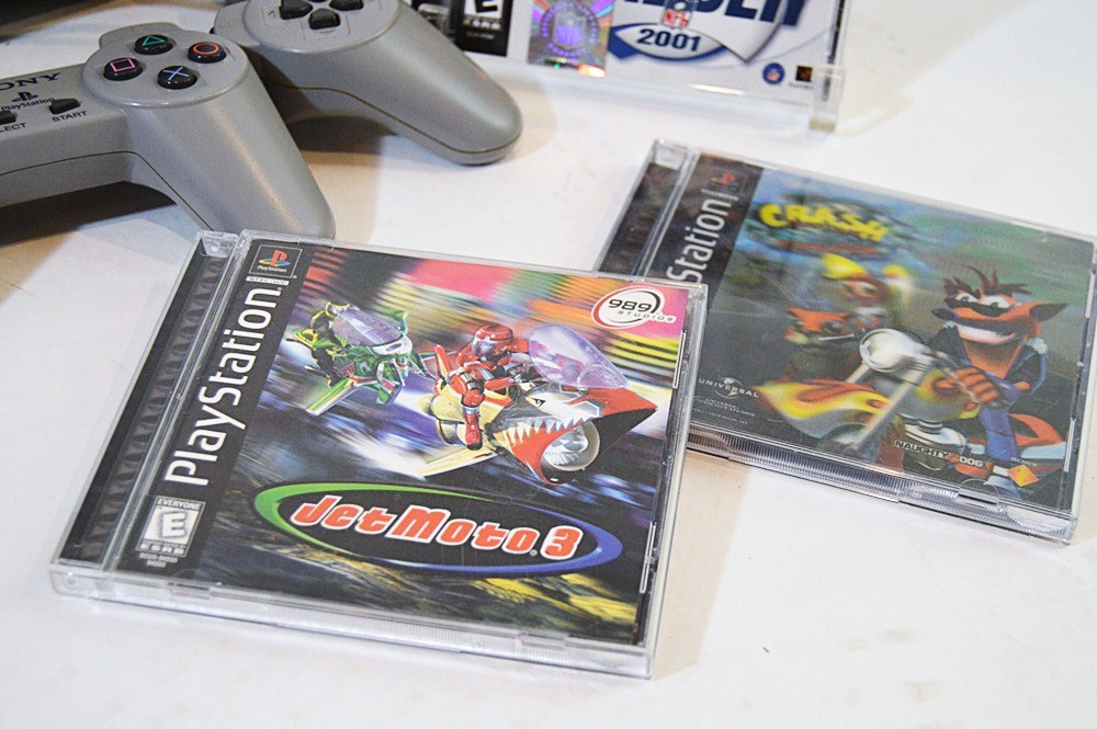 Sony Playstation with Game CD's and CD Storage Box