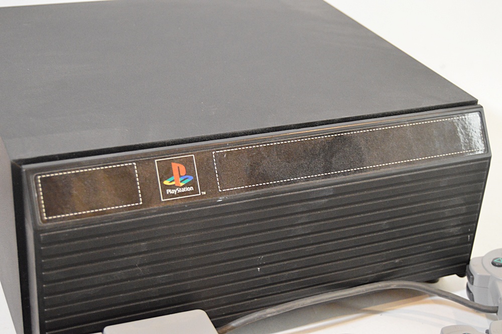 Sony Playstation with Game CD's and CD Storage Box