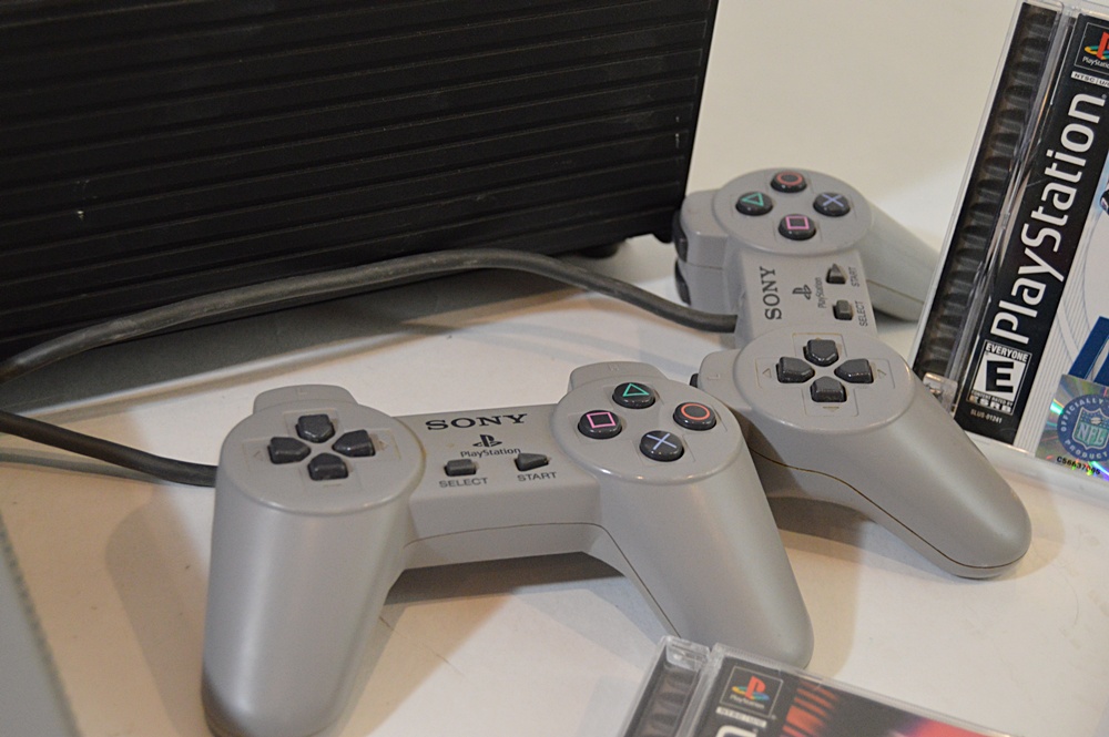 Sony Playstation with Game CD's and CD Storage Box