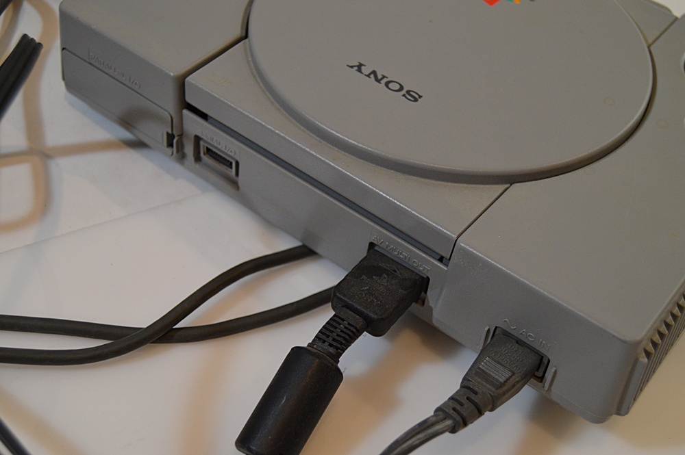 Sony Playstation with Game CD's and CD Storage Box