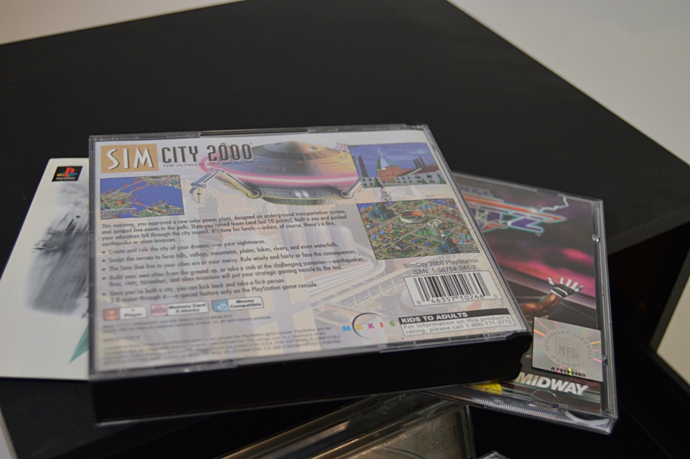 Sony Playstation with Game CD's and CD Storage Box