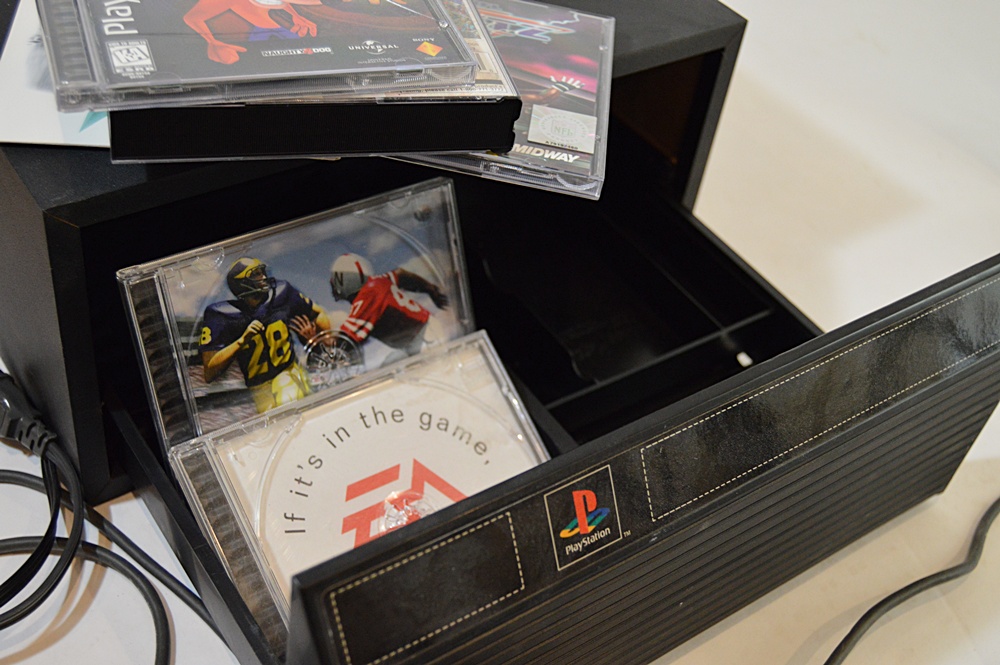 Sony Playstation with Game CD's and CD Storage Box