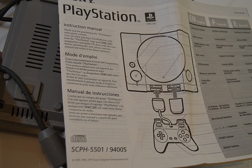 Sony Playstation with Game CD's and CD Storage Box