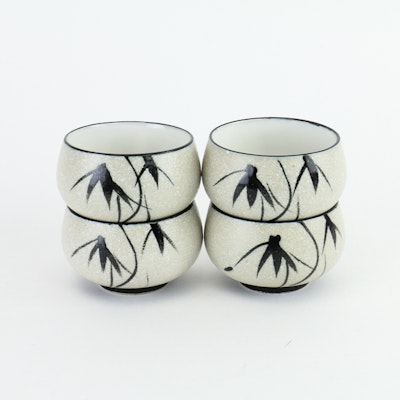 Four Japanese Hand-Painted Tea Bowls Four Japanese Hand-Painted Tea Bowls