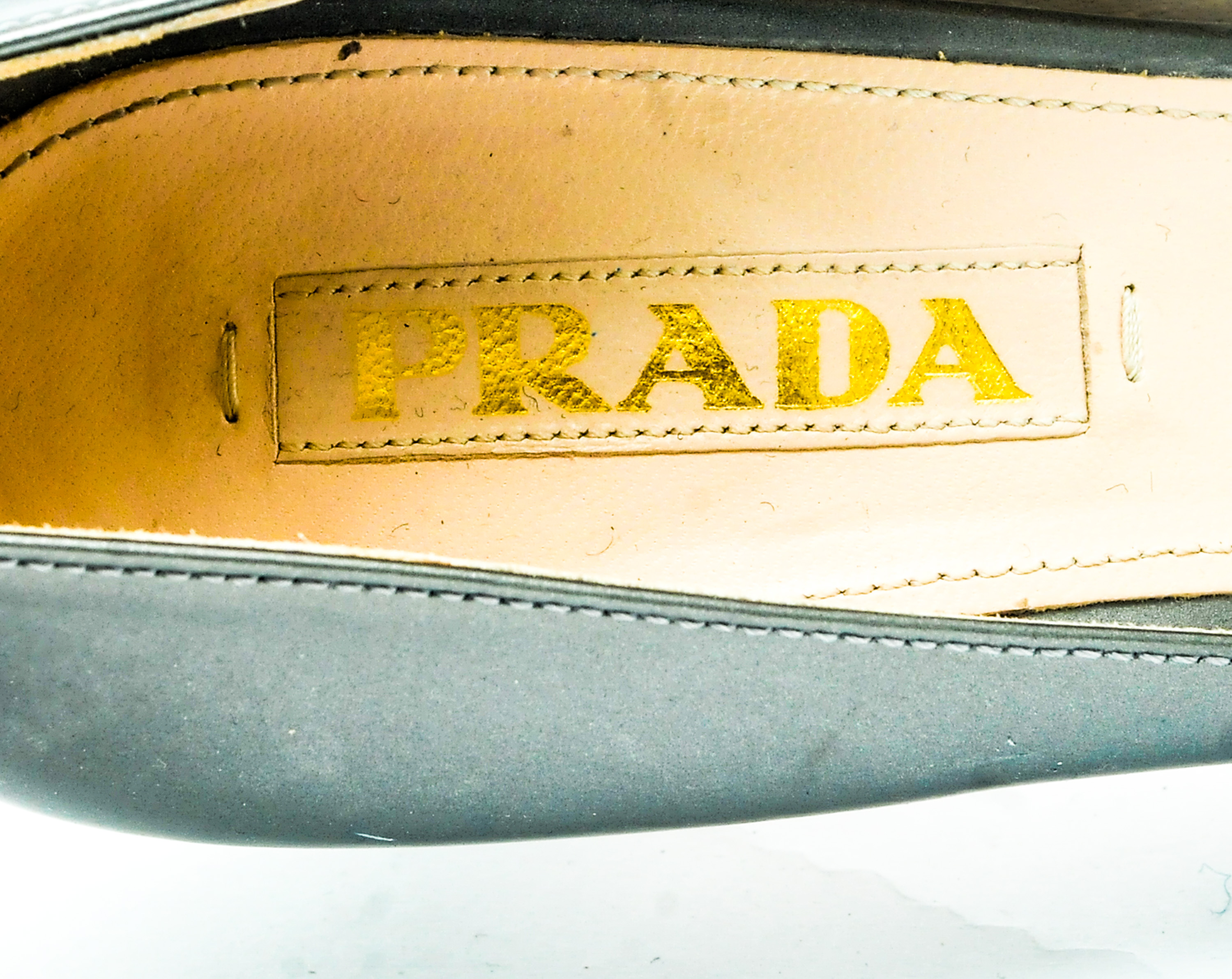 Pair of Silver Tone Prada Pumps