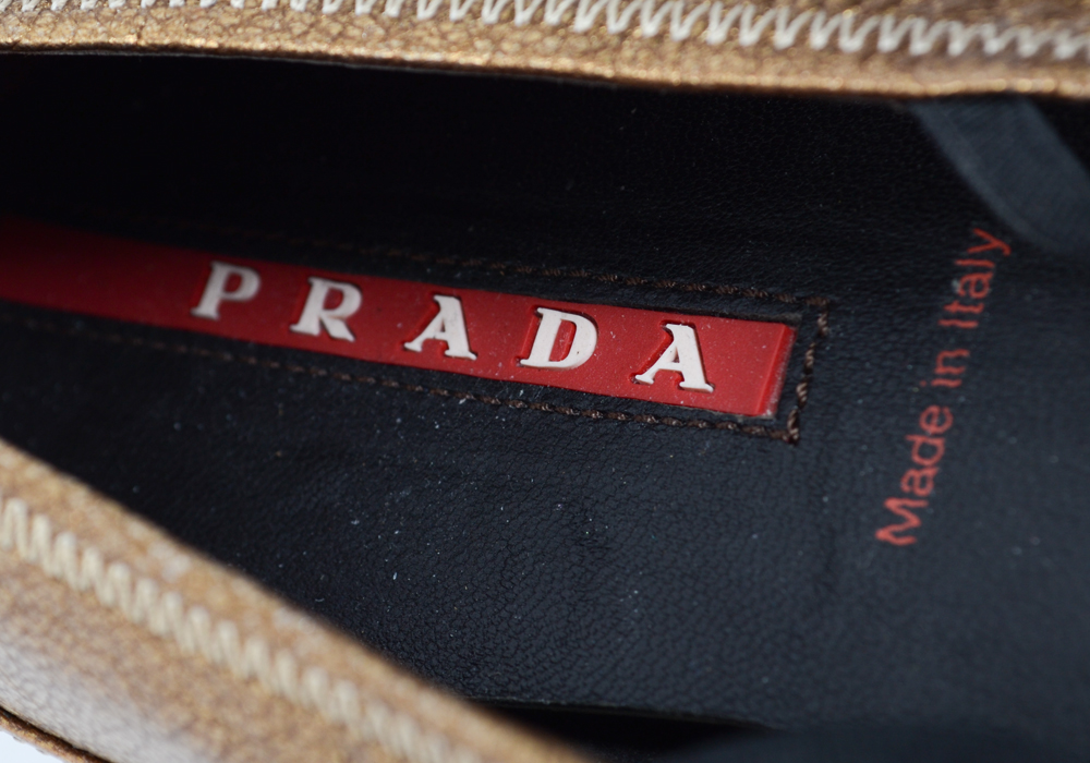 Gold Tone Prada Flats