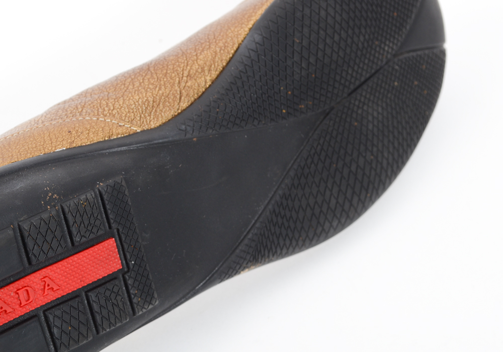 Gold Tone Prada Flats