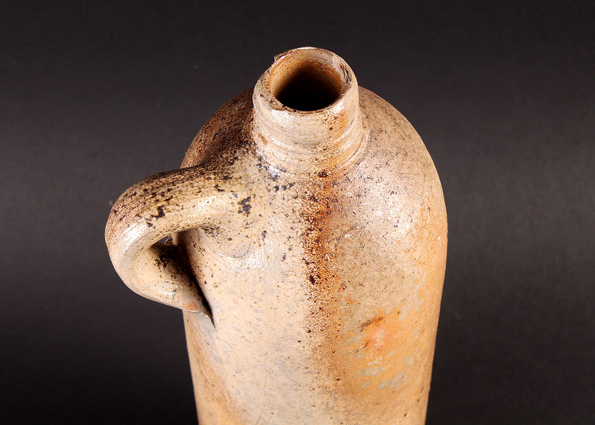 Three Vintage Alcohol Jugs