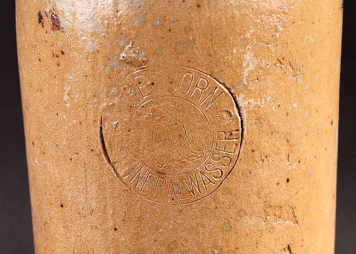 Three Vintage Alcohol Jugs