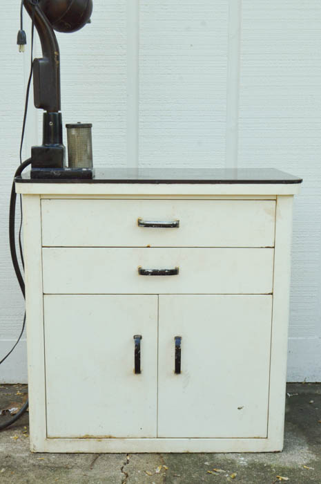 Vintage Metal Cabinet with an Enamel Top and Attached Dentist Drill