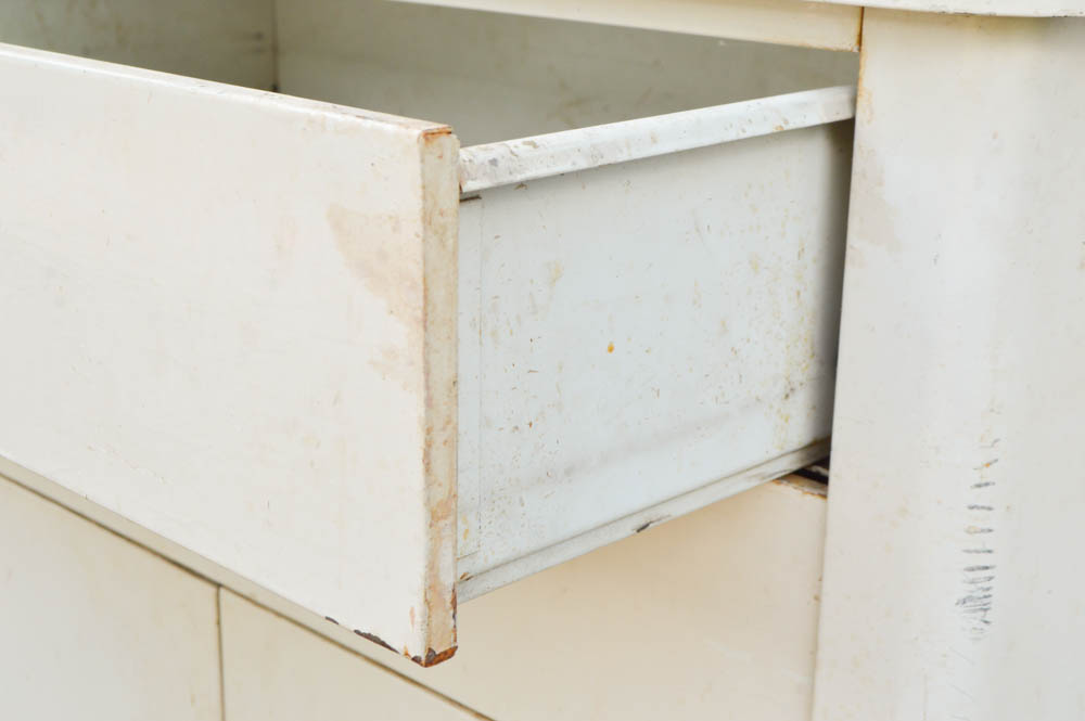 Vintage Metal Cabinet with an Enamel Top and Attached Dentist Drill
