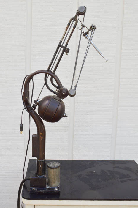 Vintage Metal Cabinet with an Enamel Top and Attached Dentist Drill