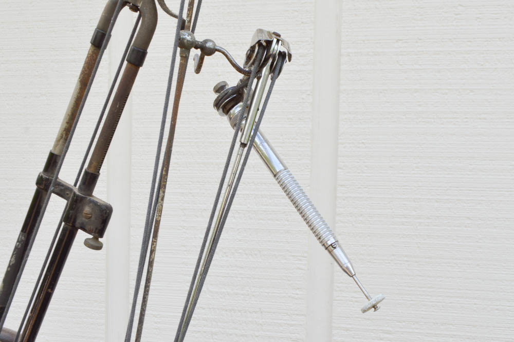 Vintage Metal Cabinet with an Enamel Top and Attached Dentist Drill