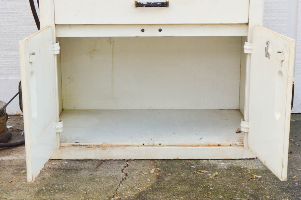 Vintage Metal Cabinet with an Enamel Top and Attached Dentist Drill