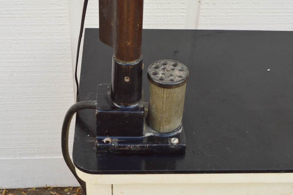 Vintage Metal Cabinet with an Enamel Top and Attached Dentist Drill