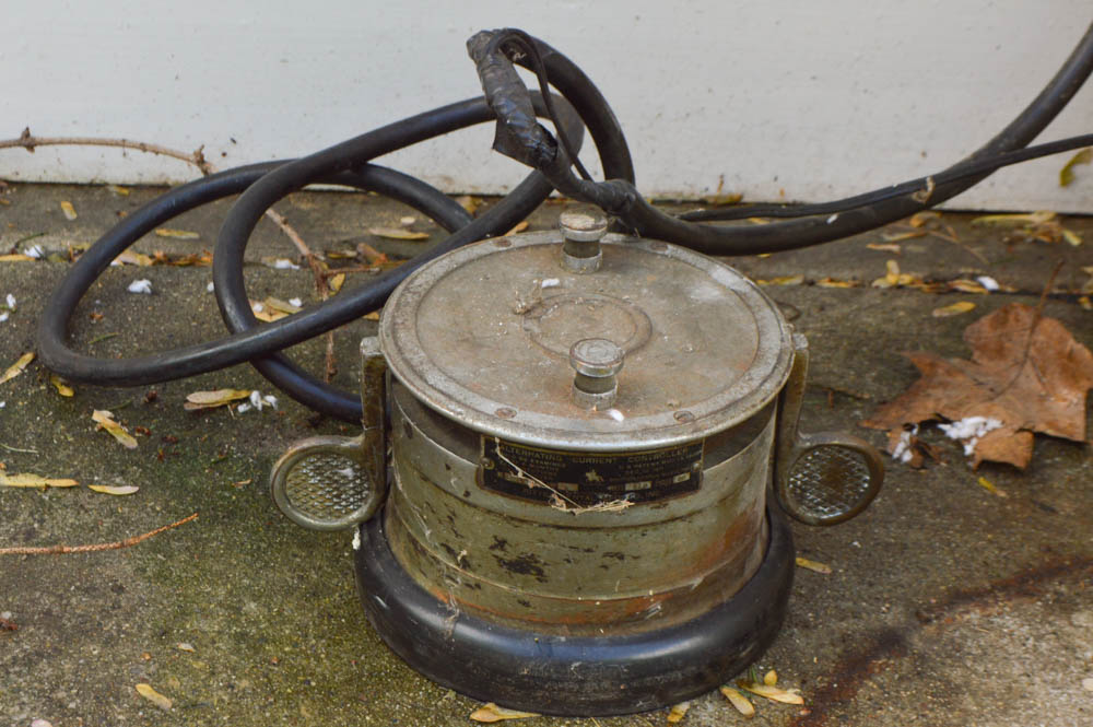 Vintage Metal Cabinet with an Enamel Top and Attached Dentist Drill