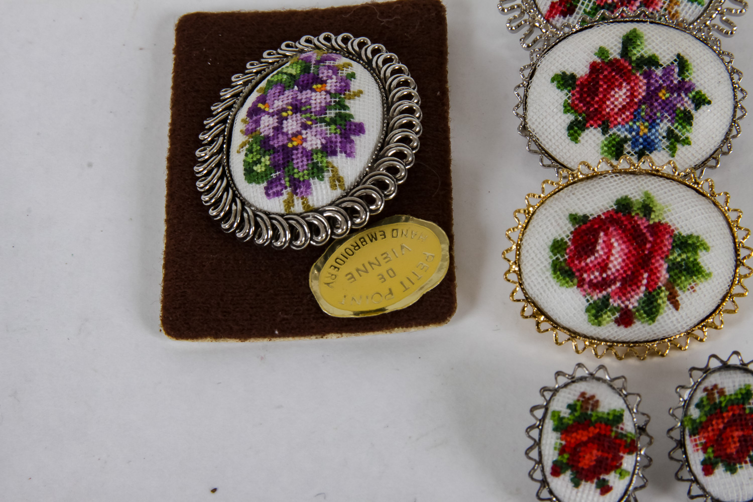 Collection of Hand-Embroidered Floral Brooches and Earrings