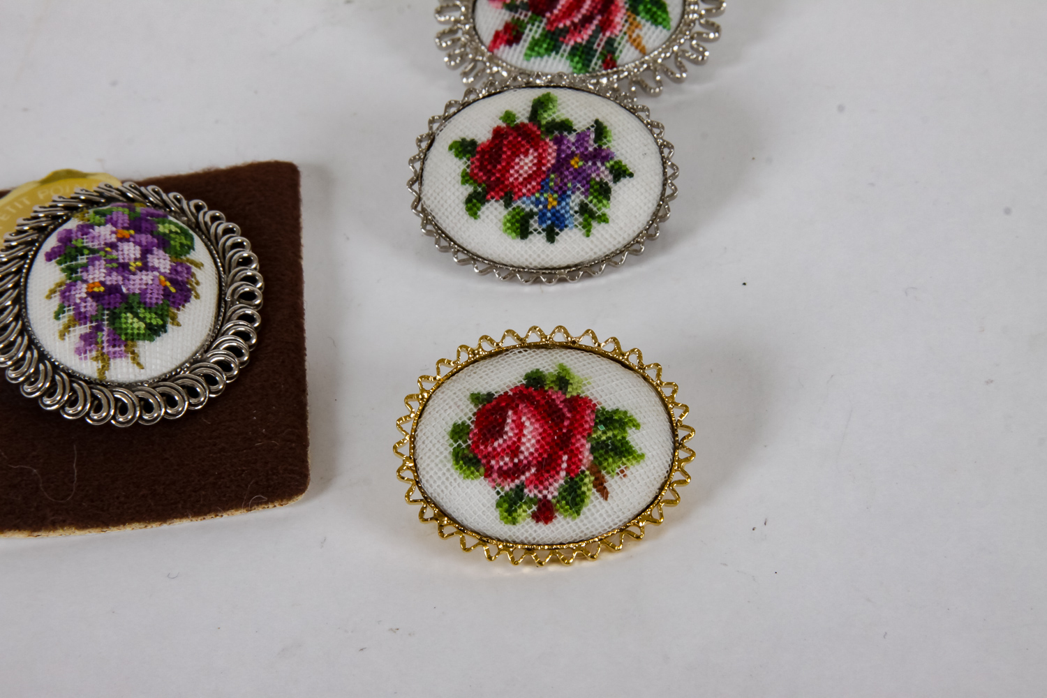 Collection of Hand-Embroidered Floral Brooches and Earrings