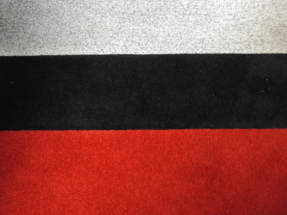 Tri-Color Area Rug by Fabrica