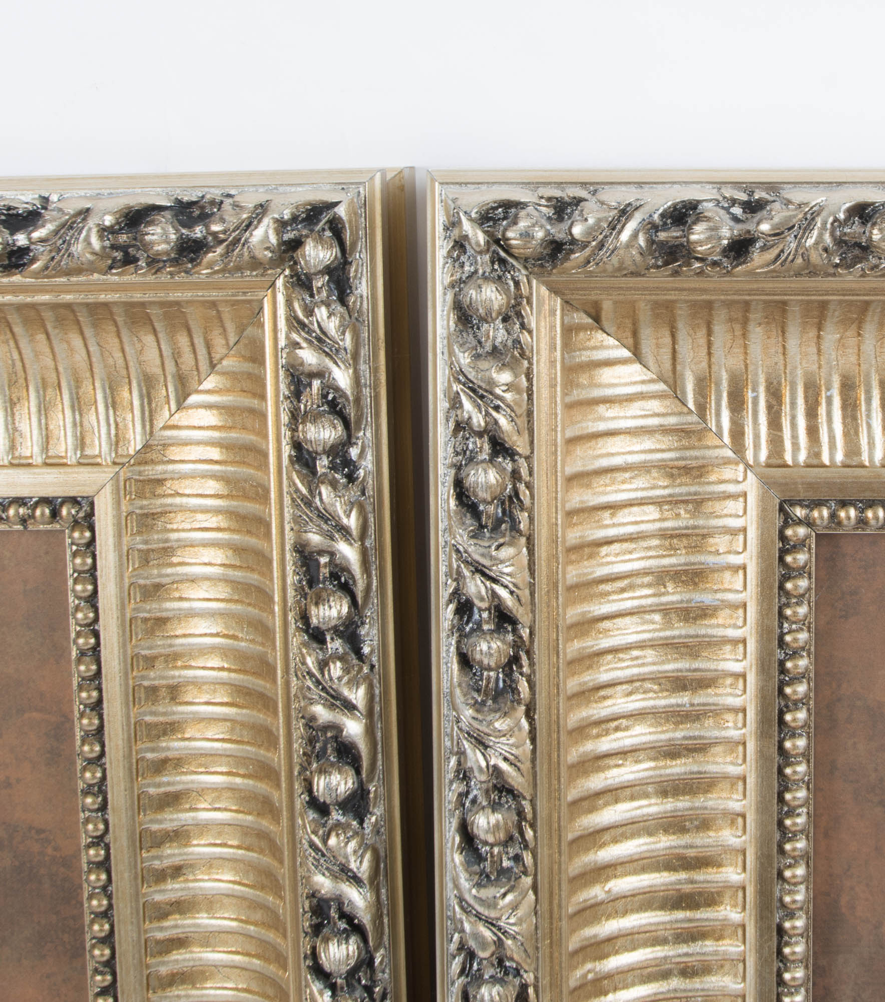 Pair of C. Butler Pendley Embossed Artwork