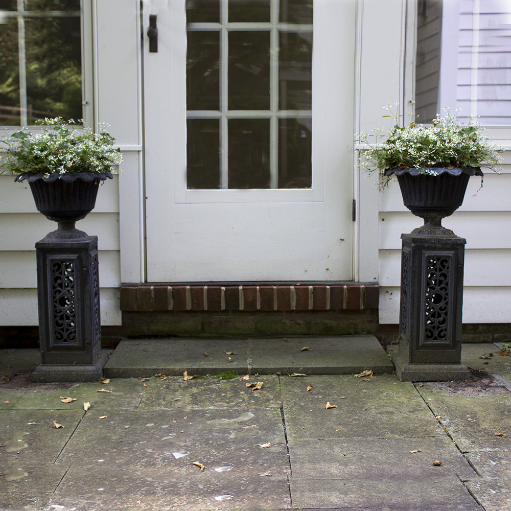 Pair of Metal Pedestal Planters