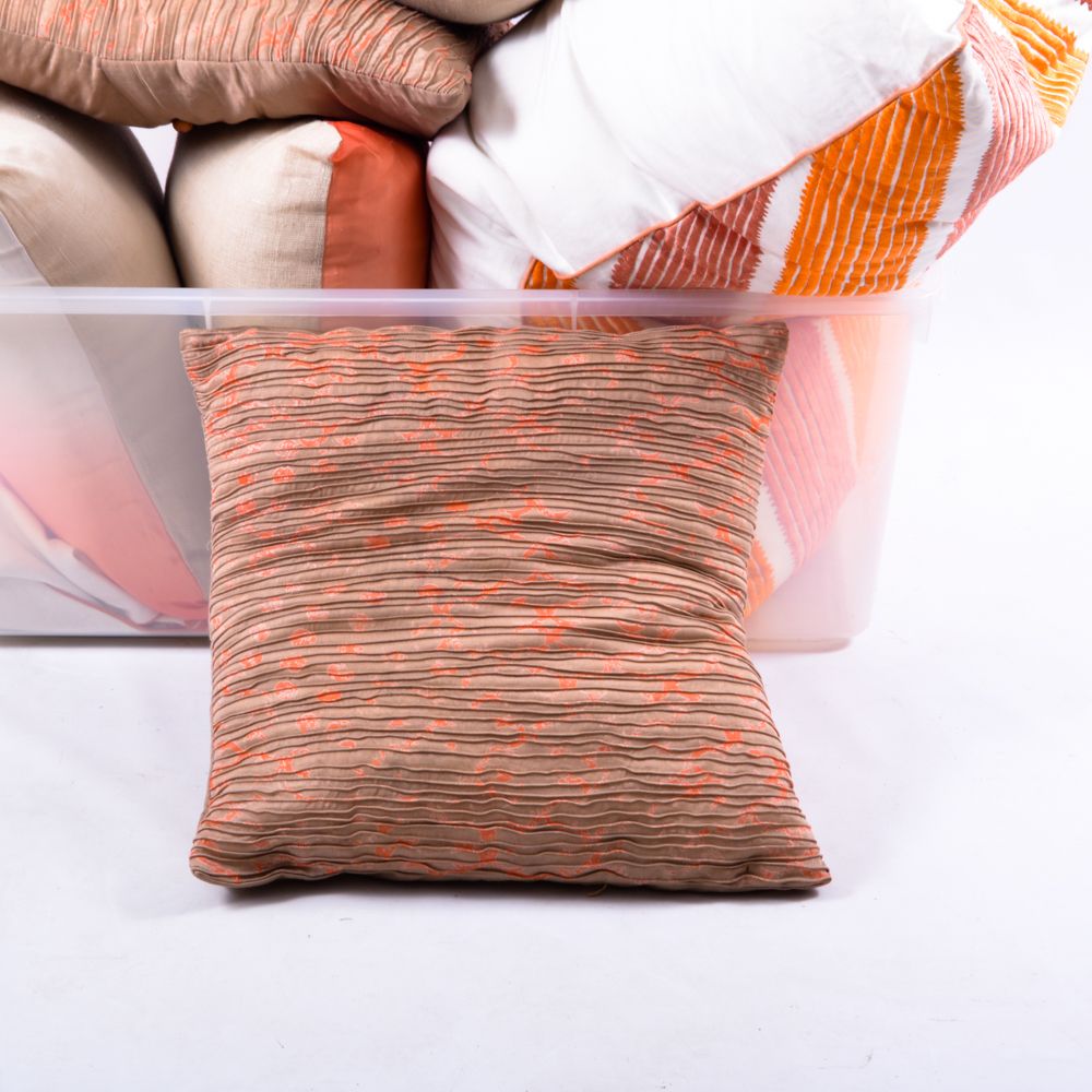 Beige, Orange, and Cream Accent Pillows