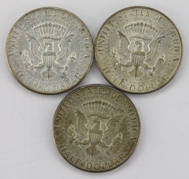 Seven Circulated 40% Silver Kennedy Half Dollars, Circa 1960s