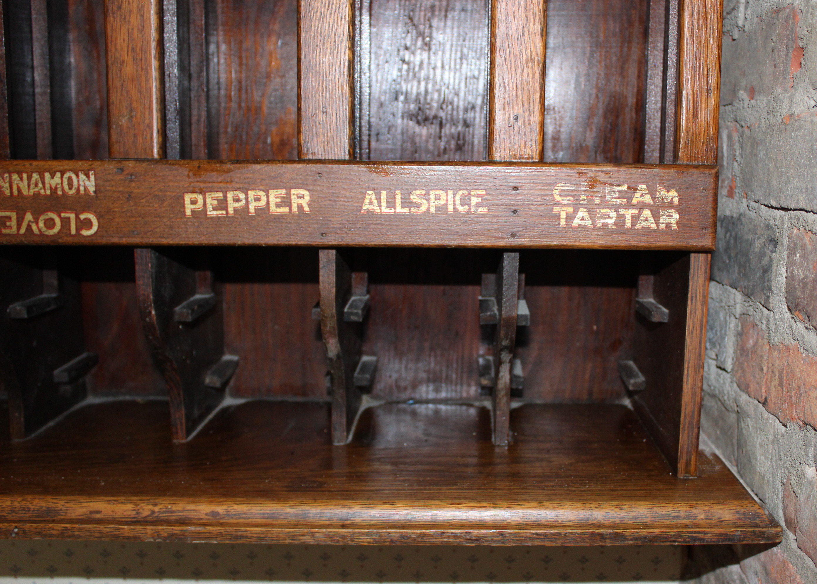 Woolson's Wall-Mount Display Spice Rack and Front of Shipping Crate