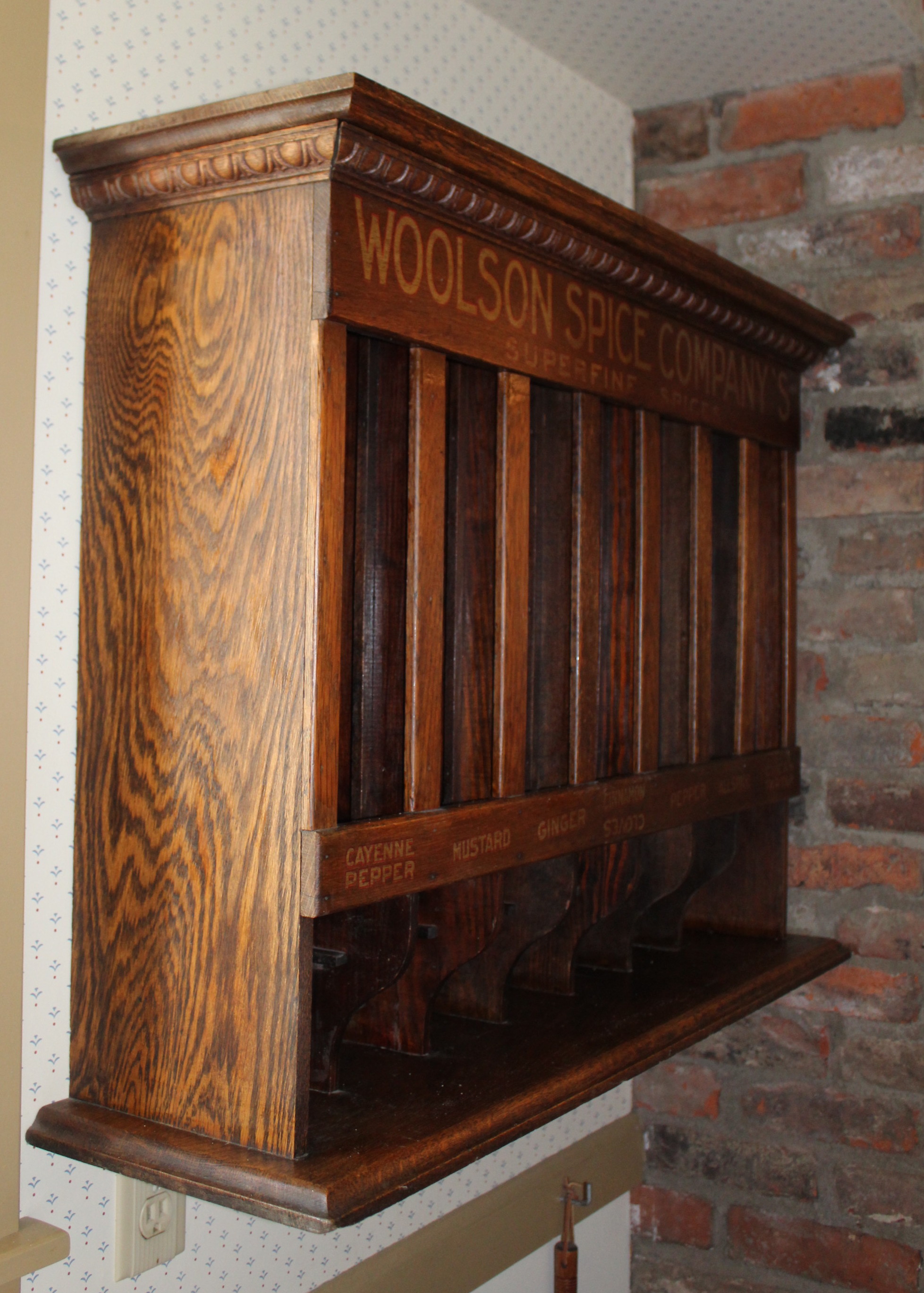 Woolson's Wall-Mount Display Spice Rack and Front of Shipping Crate