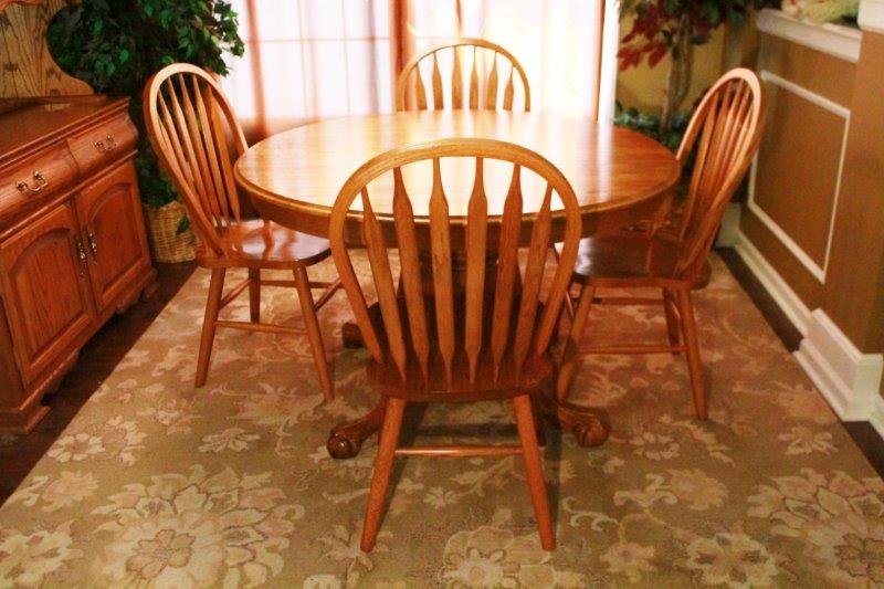 Oak Pedestal Table and Seven Chairs