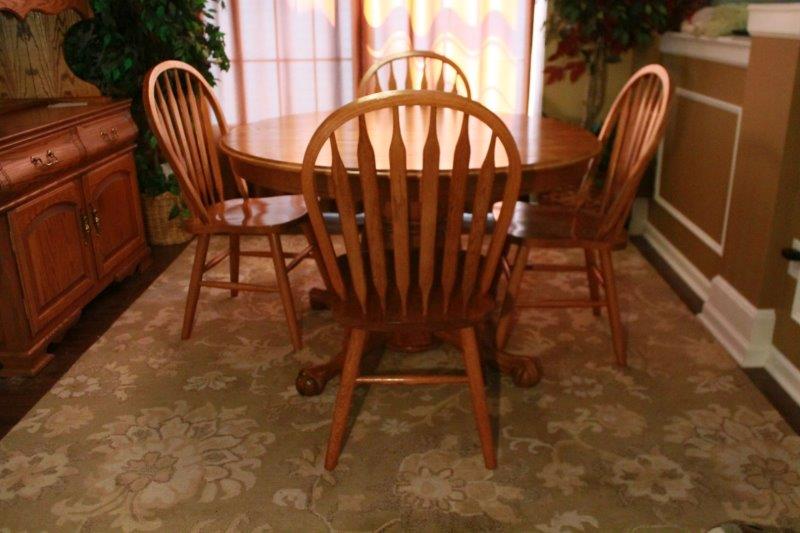 Oak Pedestal Table and Seven Chairs