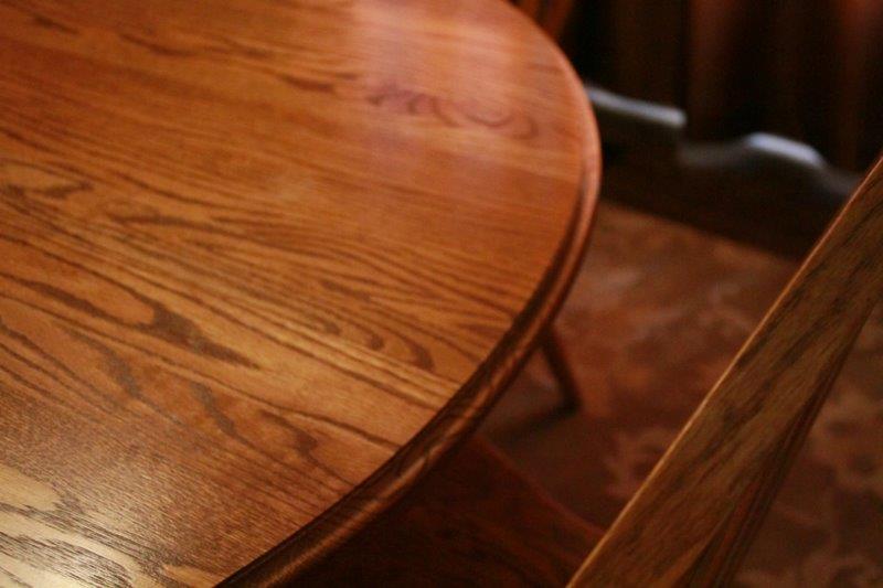 Oak Pedestal Table and Seven Chairs