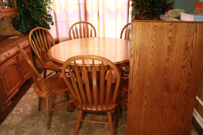 Oak Pedestal Table and Seven Chairs