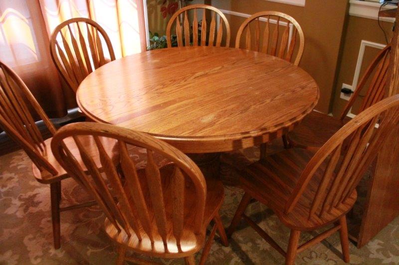 Oak Pedestal Table and Seven Chairs