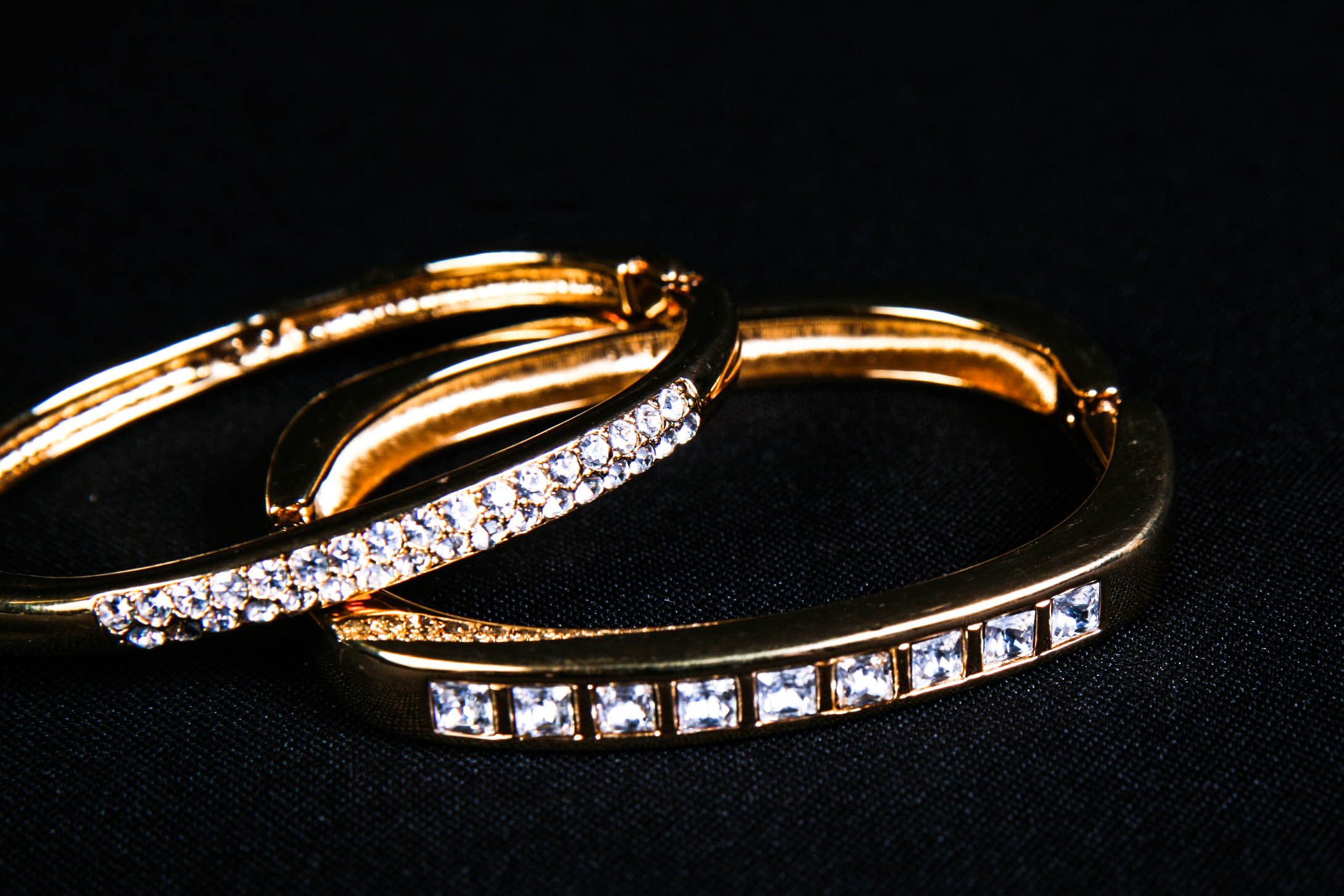 Two Vintage Swarovski Gold Tone and Crystal Bangle