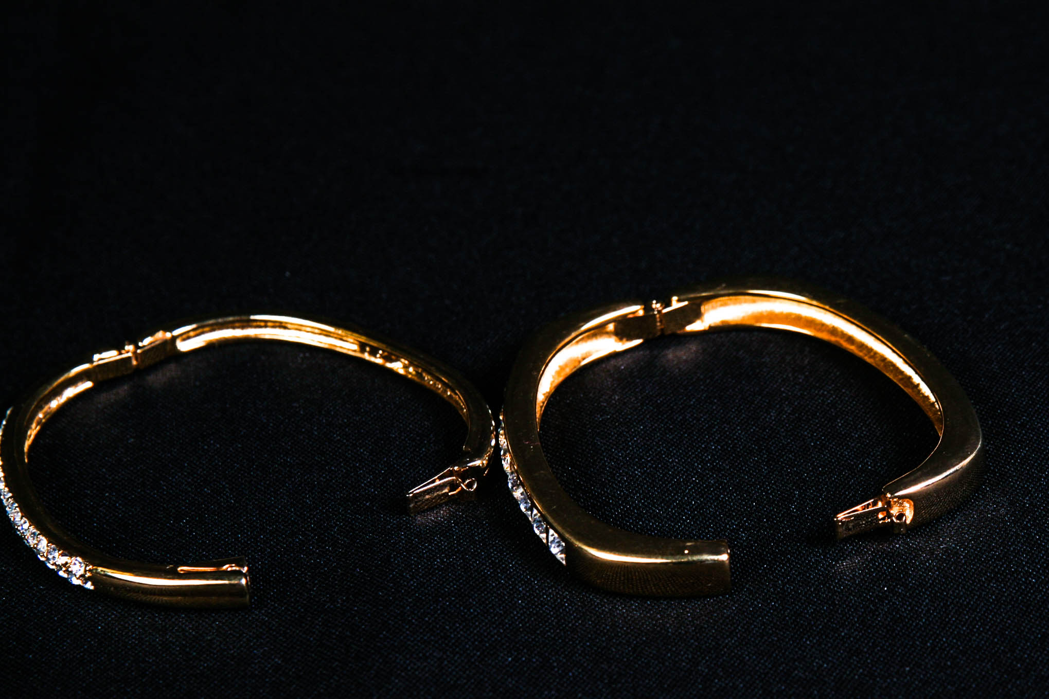 Two Vintage Swarovski Gold Tone and Crystal Bangle