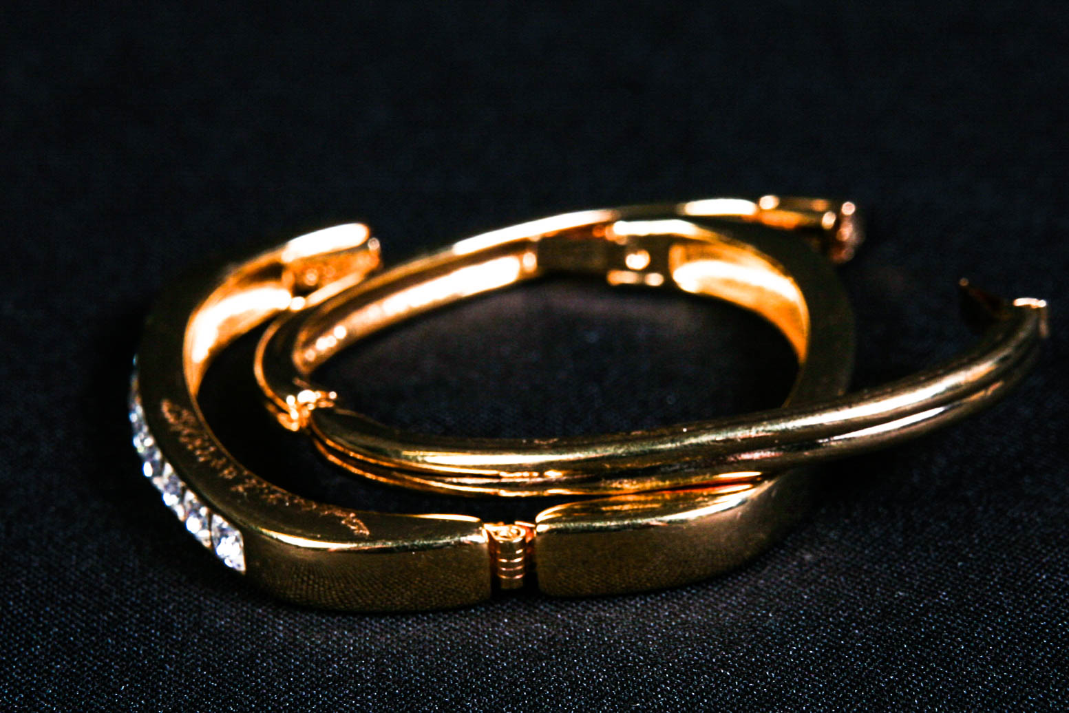 Two Vintage Swarovski Gold Tone and Crystal Bangle