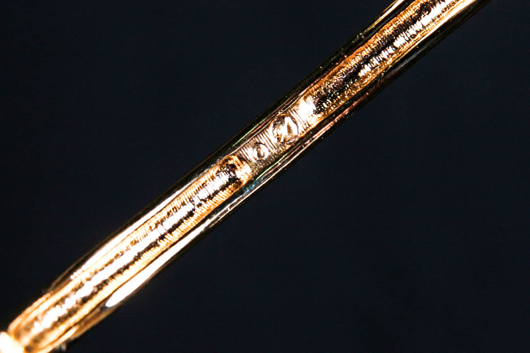 Two Vintage Swarovski Gold Tone and Crystal Bangle