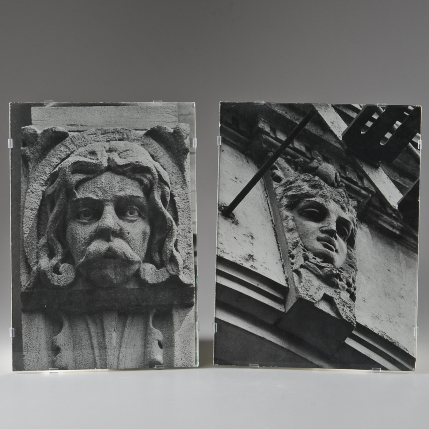 Pair of Photographs of Stone Carvings Under Glass