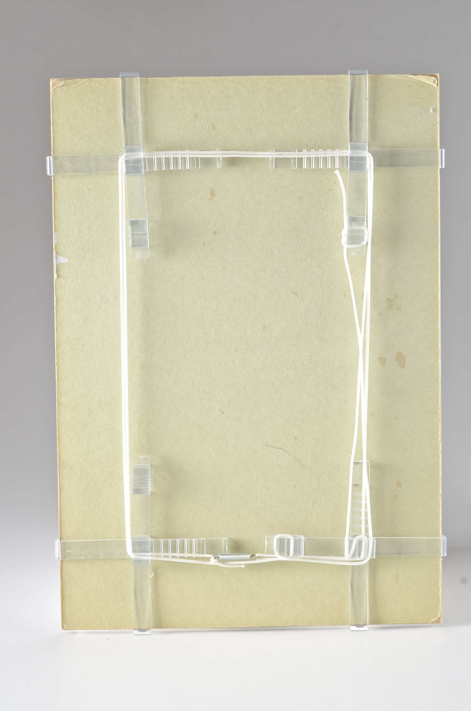 Pair of Photographs of Stone Carvings Under Glass